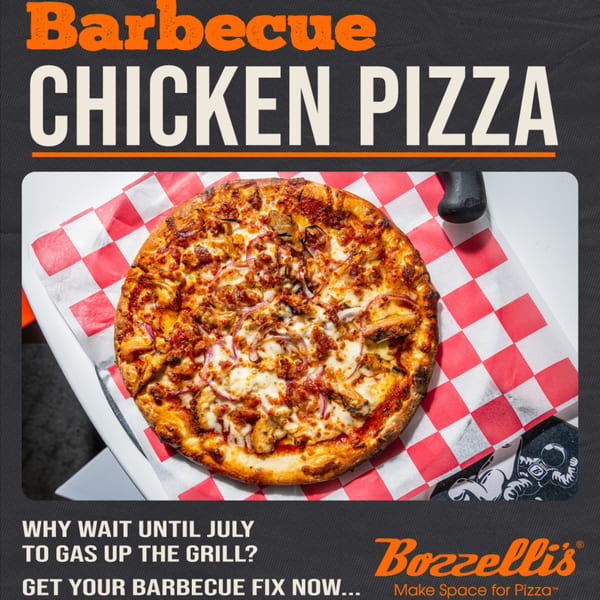 A Bozzelli's Barbecue Chicken Pizza, topped with chicken, red onions, and melted cheese, on checkered paper.